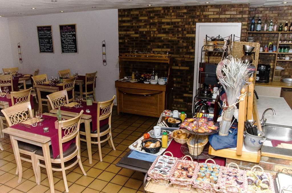 南南锡 - 卢德斯基里亚德酒店 餐厅 照片